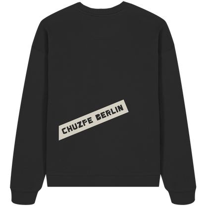 THE MARK Oversize Sweatshirt in Schwarz, Rückansicht mit Druck CHUZPE BERLIN